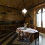 Raggiungiamo ora la parte pi� caratteristica dell�abitazione: la suggestiva sala da pranzo. Si presenta interamente decorata, sia sulle pareti che sulla volta...